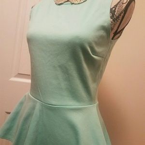 Peplum... minty top...
